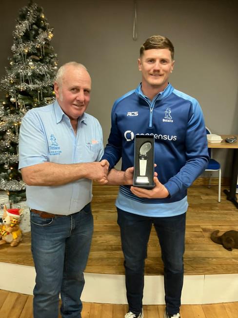 Narberth man of the match Tom Powell with the sponsor